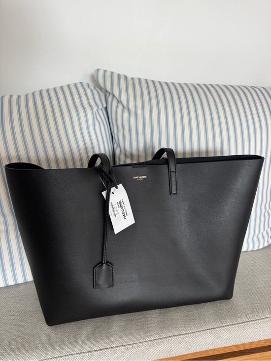 Saint Laurent Handbags - Saint Laurent Black Leather Tote with Gold Logo Accent